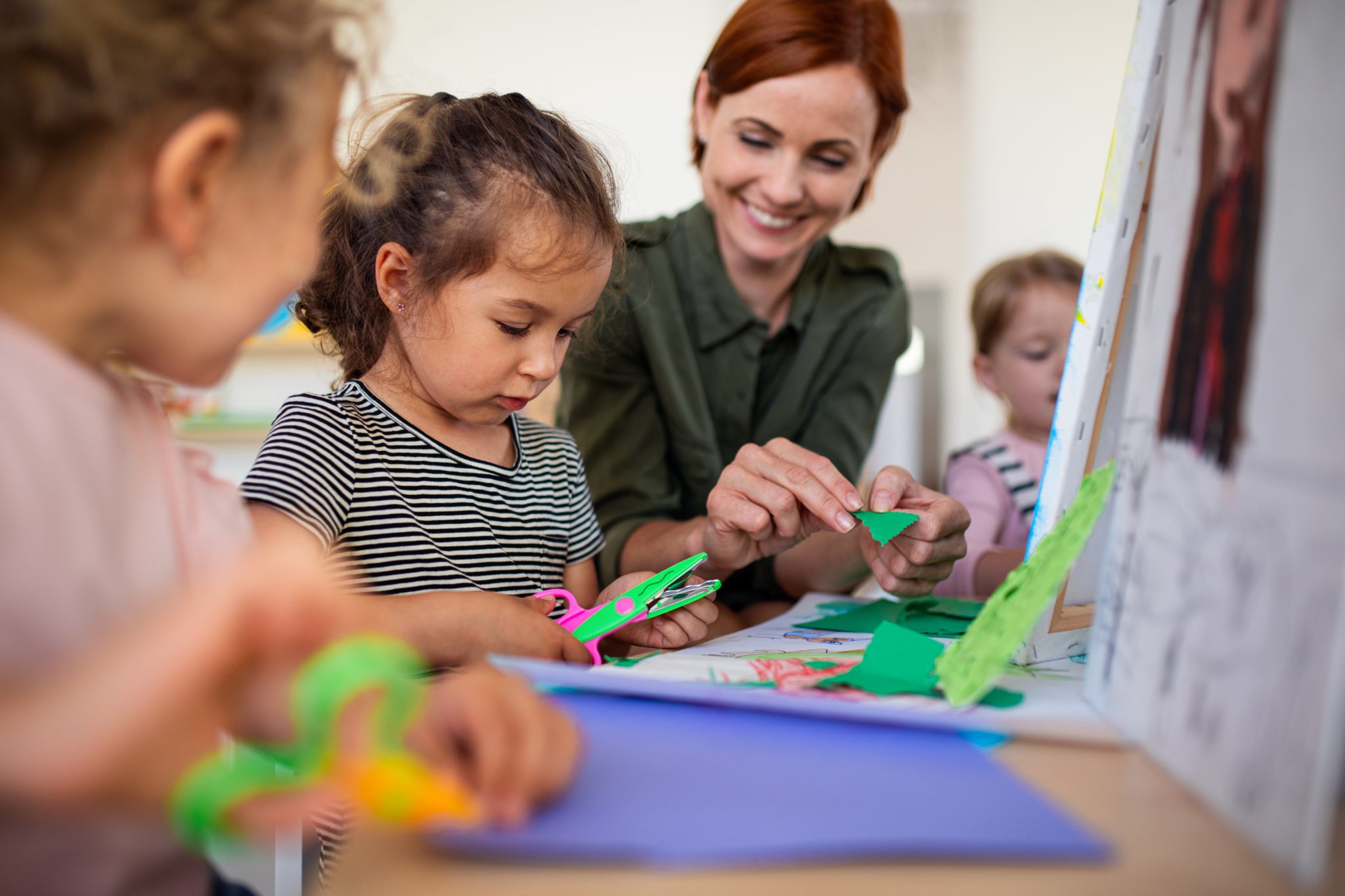 Child and educator at high kinder with high daycare rating